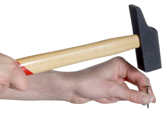 Tag der Arbeit – eine Errungenschaft der Arbeiterbewegung Hammer und Nagel als Symbol für den Tag der Arbeit